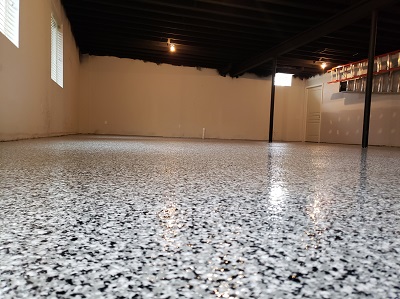 Basement floor that has a decorative design with epoxy