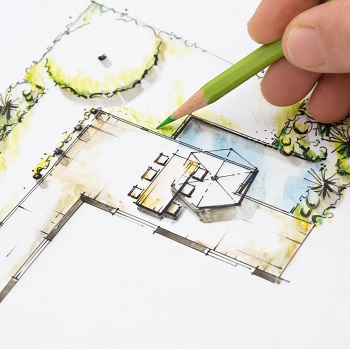 Hand sketching a landscape