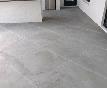 Etched concrete to resemble tile.