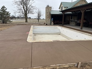 Swimming pool showing a newly place pool desk