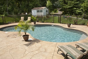 Swimming pool showing a newly place pool desk