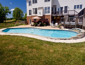 Swimming pool showing a newly place pool desk