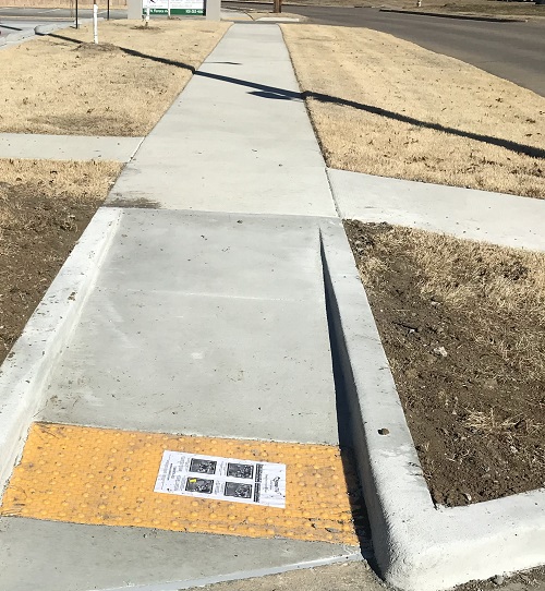 Finished sidewalk with wheel chair access
